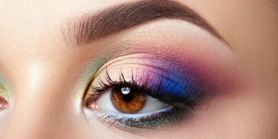 Closeup view of woman eye with evening makeup